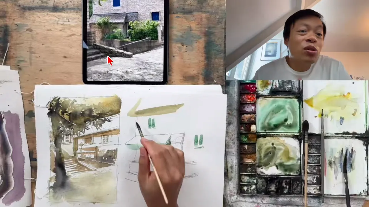 Painting a little sketch from a student's photo shown on the tablet.